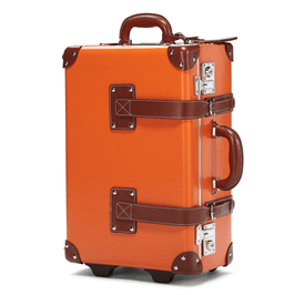 Angled product view of the carry-on Anthropologist leather suitcase in orange