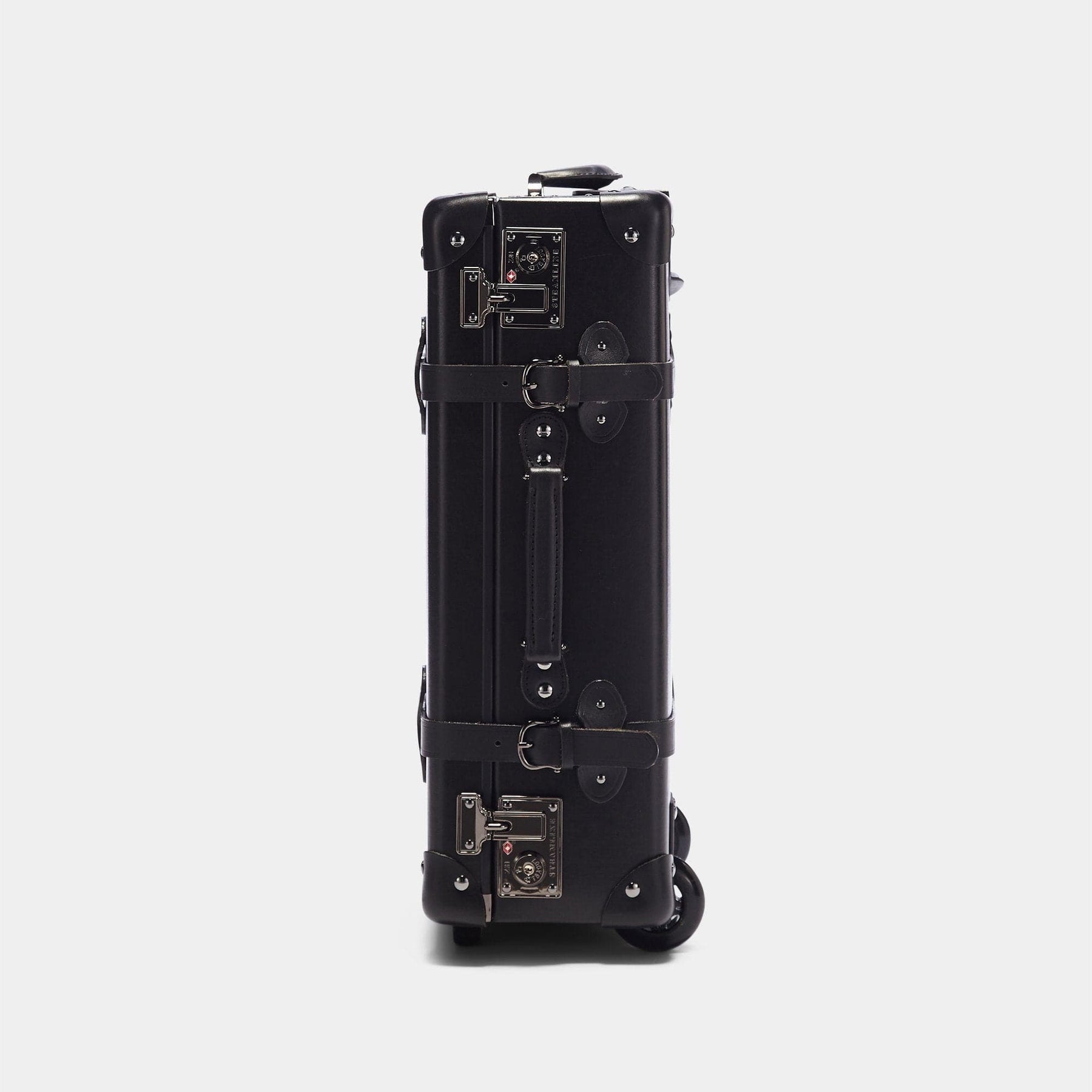 Side product view of the carry-on Industrialist fibreboard suitcase in black