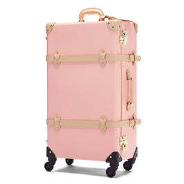 Angled product view of the check-in Correspondent fibreboard suitcase in pink