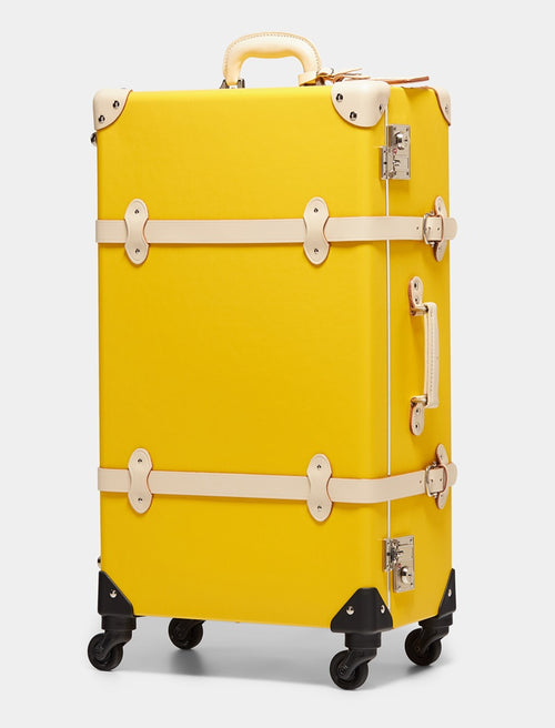 Dujour, Feb 2024 - 'Your New Favorite Colorful Luggage: The Correspondent Yellow'