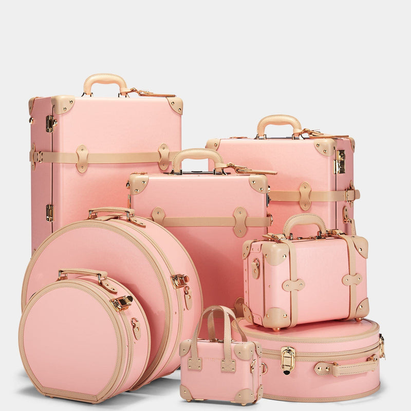Steamline vintage luggage set of The Correspondent fibreboard suitcase in pink