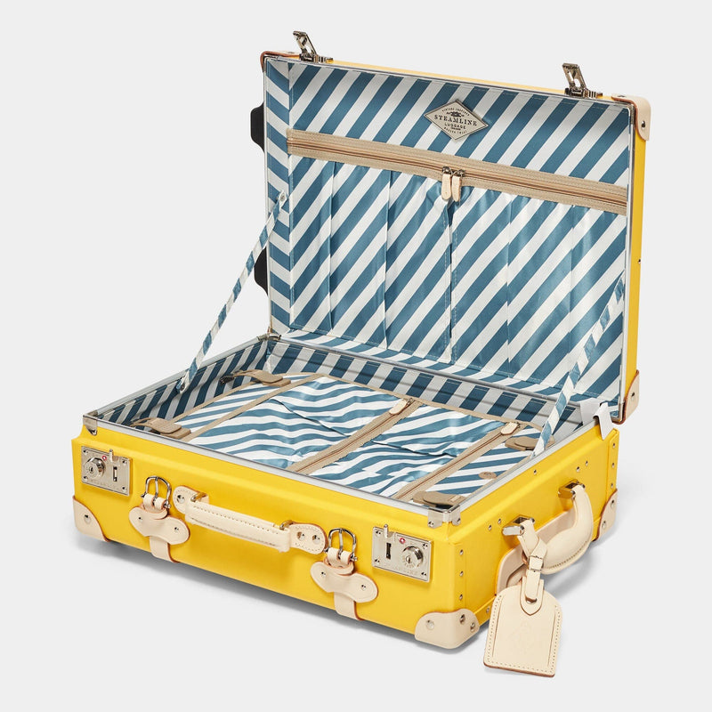 Open product view of the carry-on Correspondent fibreboard suitcase in canary yellow with blue and white stripe print lining