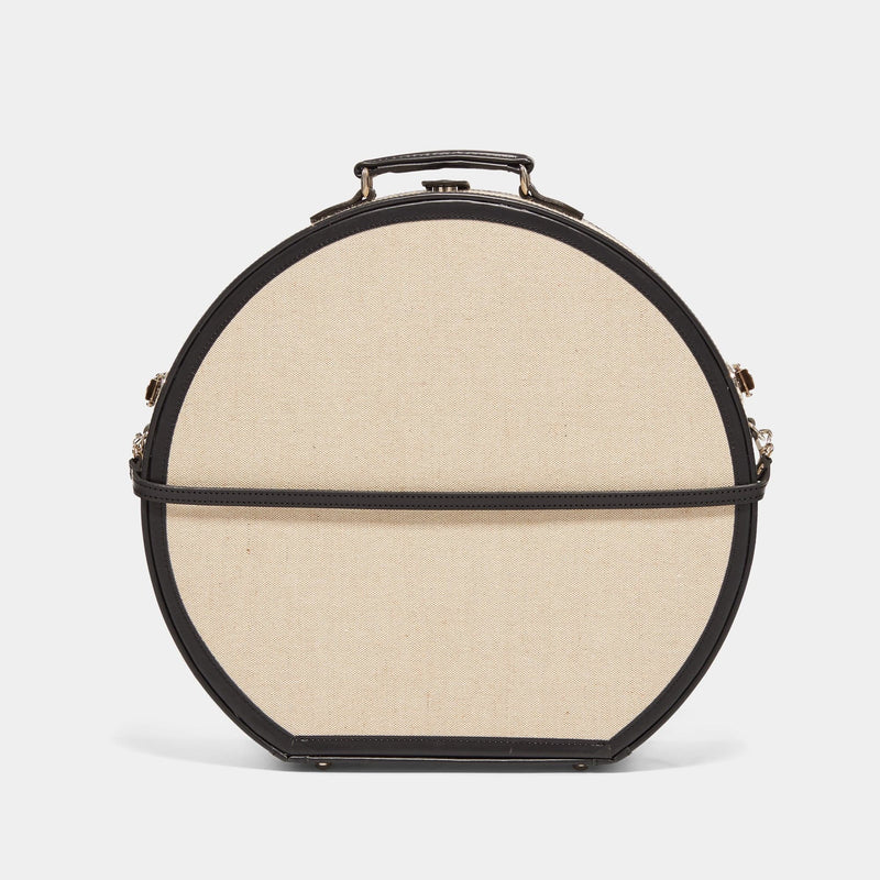 Back product view of the deluxe hatbox Editor linen suitcase with black trims and detachable suitcase strap