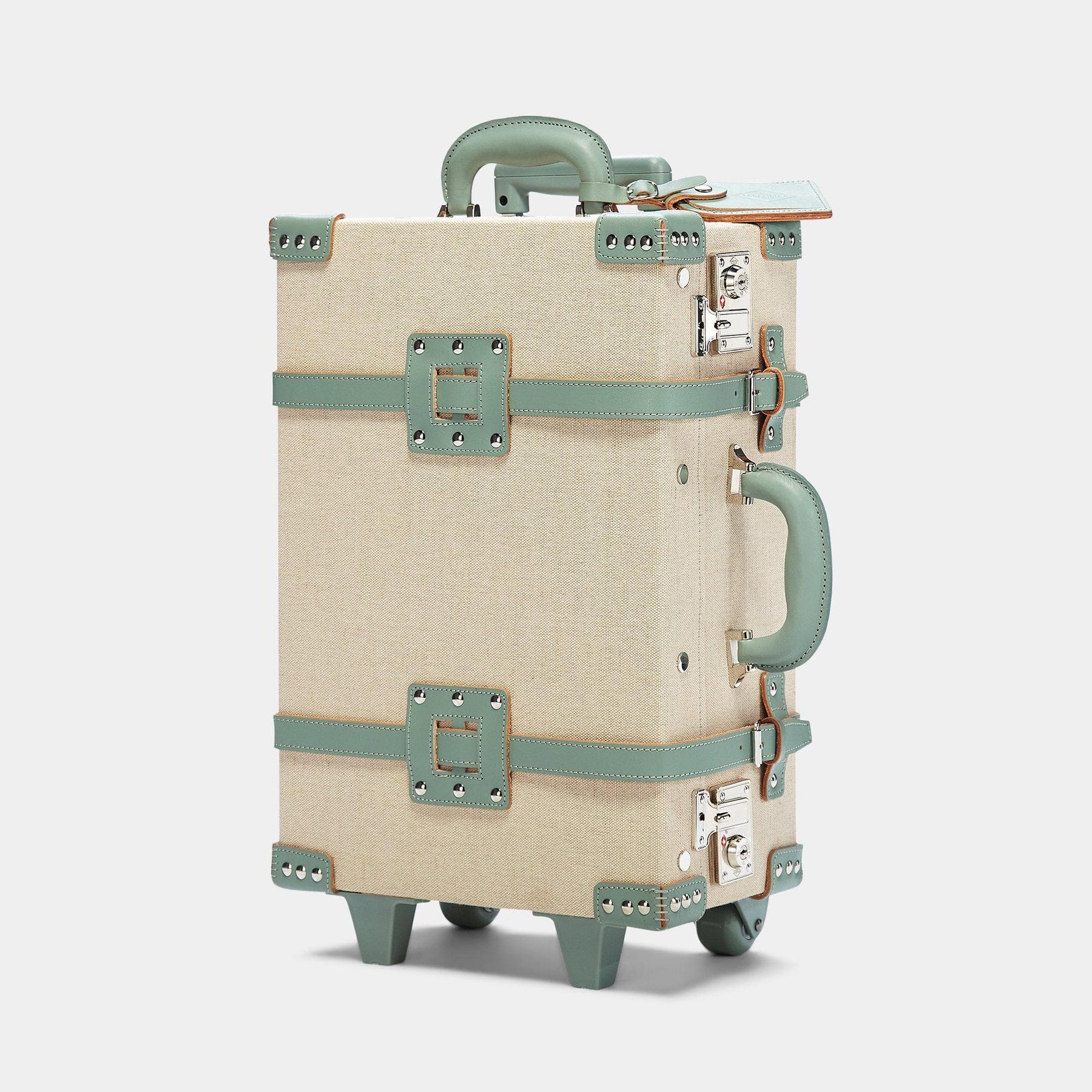 Angled product view of the carry-on Editor linen suitcase with sea green trims