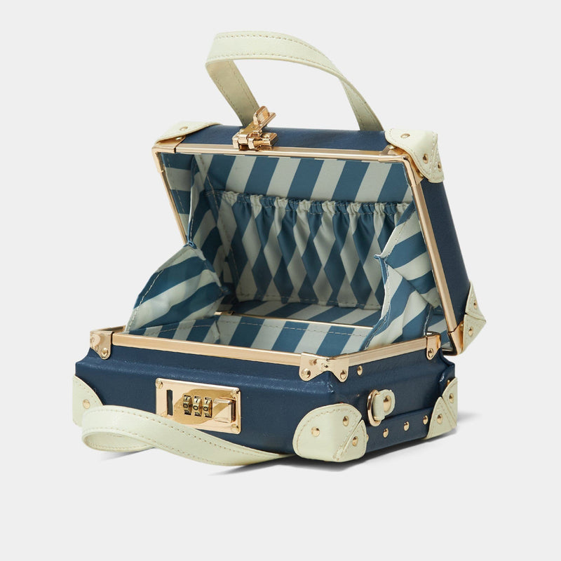 Open product view of the mini Entrepreneur vegan leather suitcase in navy with blue-white stripe print lining