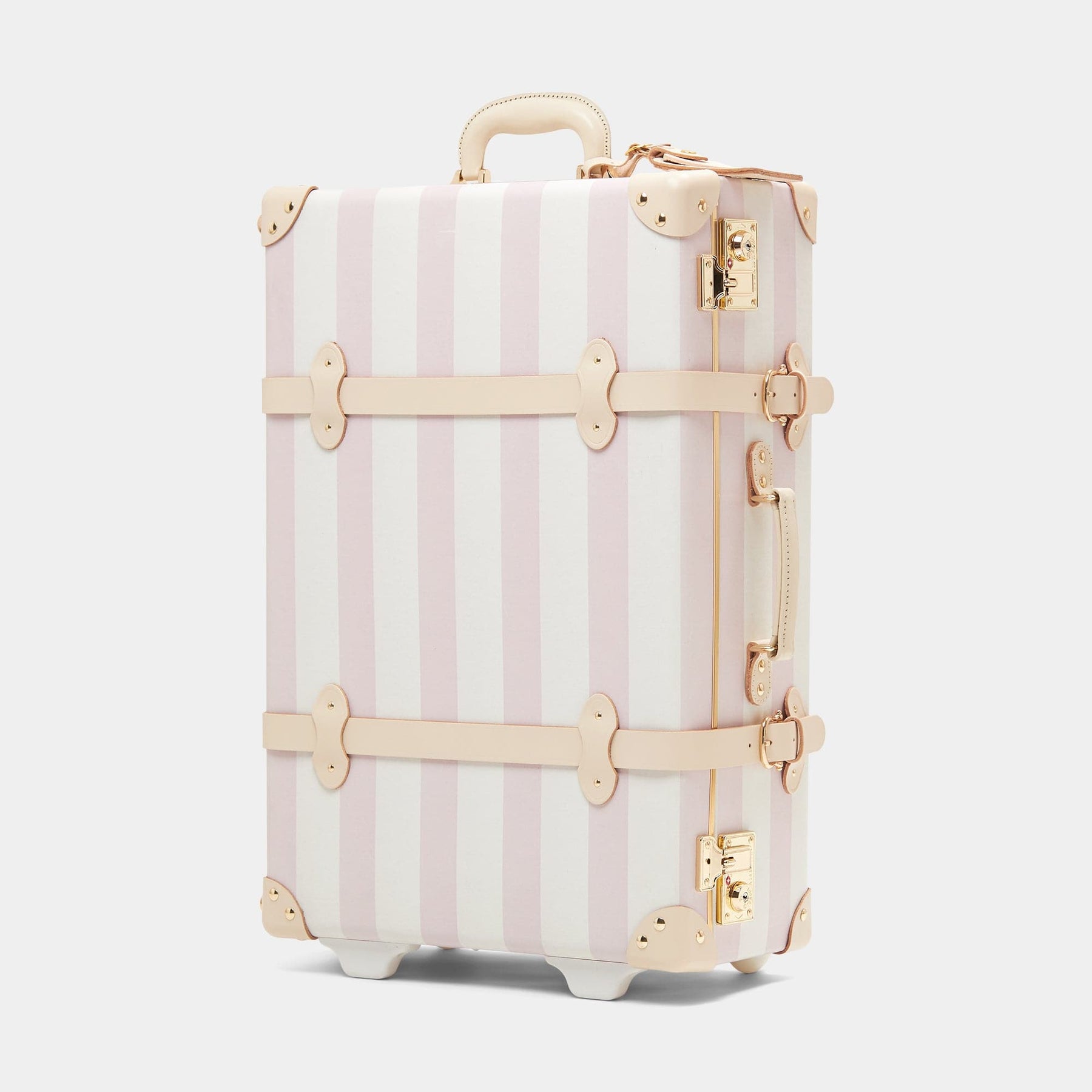 Angled product view of the stowaway Illustrator fibreboard suitcase in pink stripe