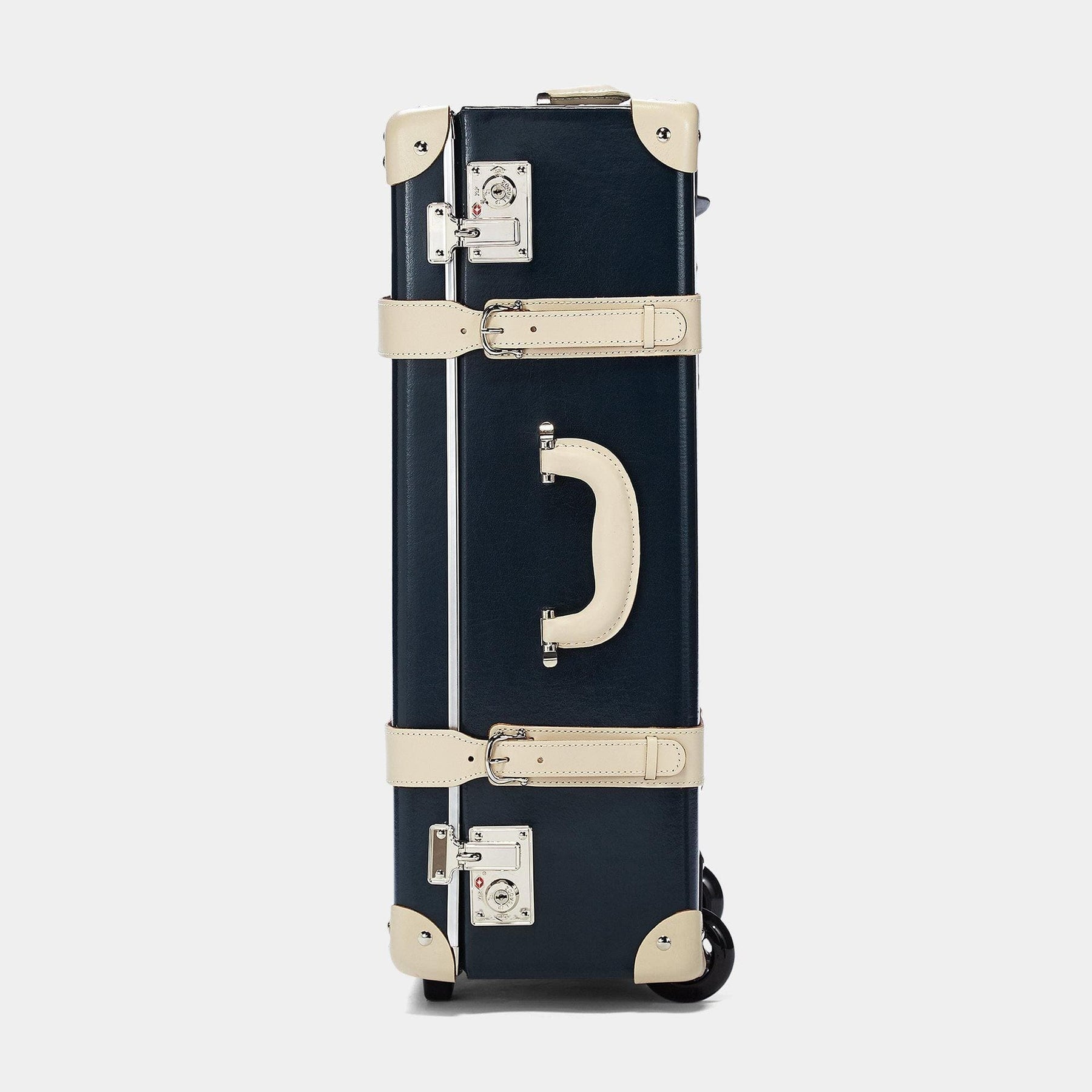 Side product view of the stowaway Anthropologist leather suitcase in navy