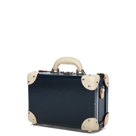 Angled product view of the vanity Anthropologist leather suitcase in navy