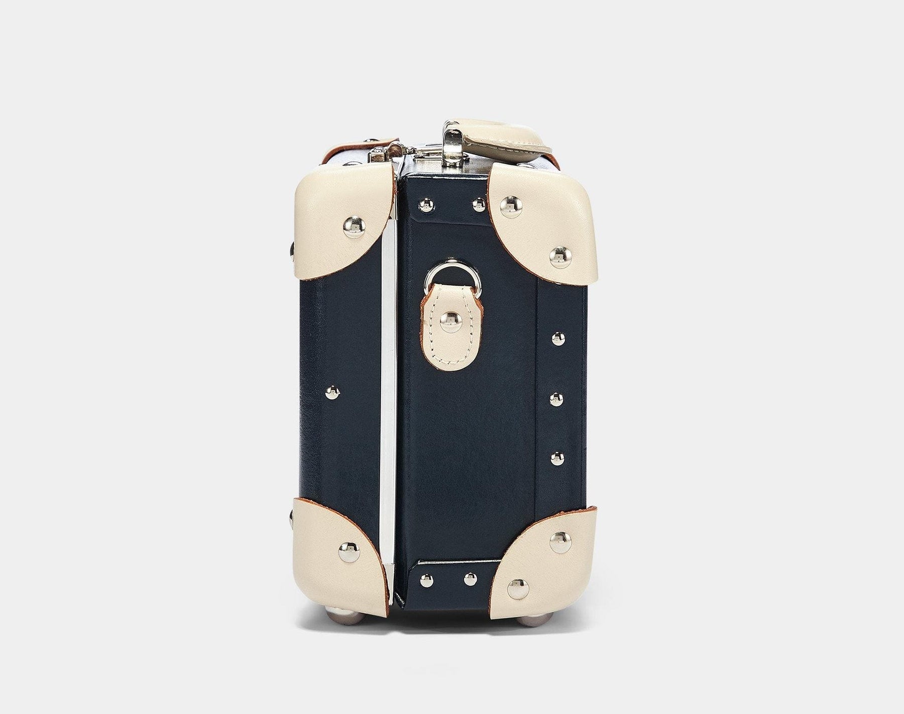 Side product view of the vanity Anthropologist leather suitcase in navy