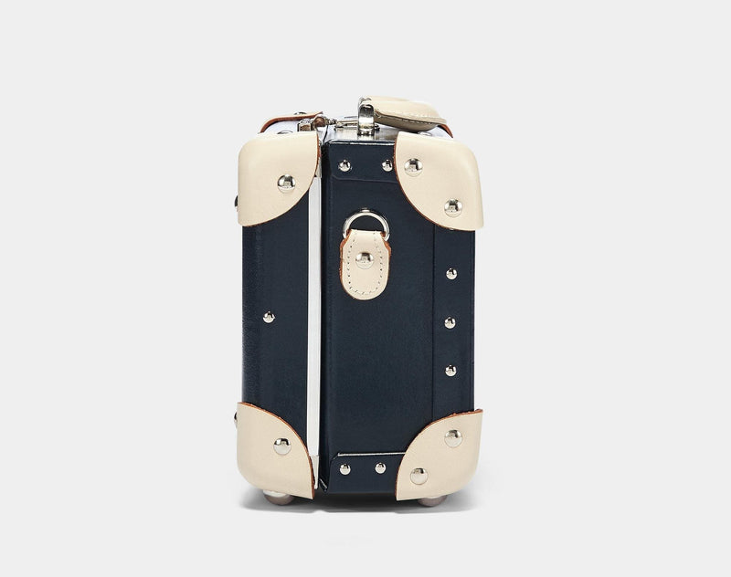 Side product view of the vanity Anthropologist leather suitcase in navy