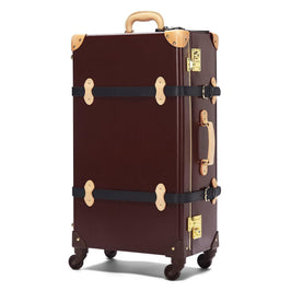 Angled product view of the check-in spinner Architect leather suitcase in burgundy