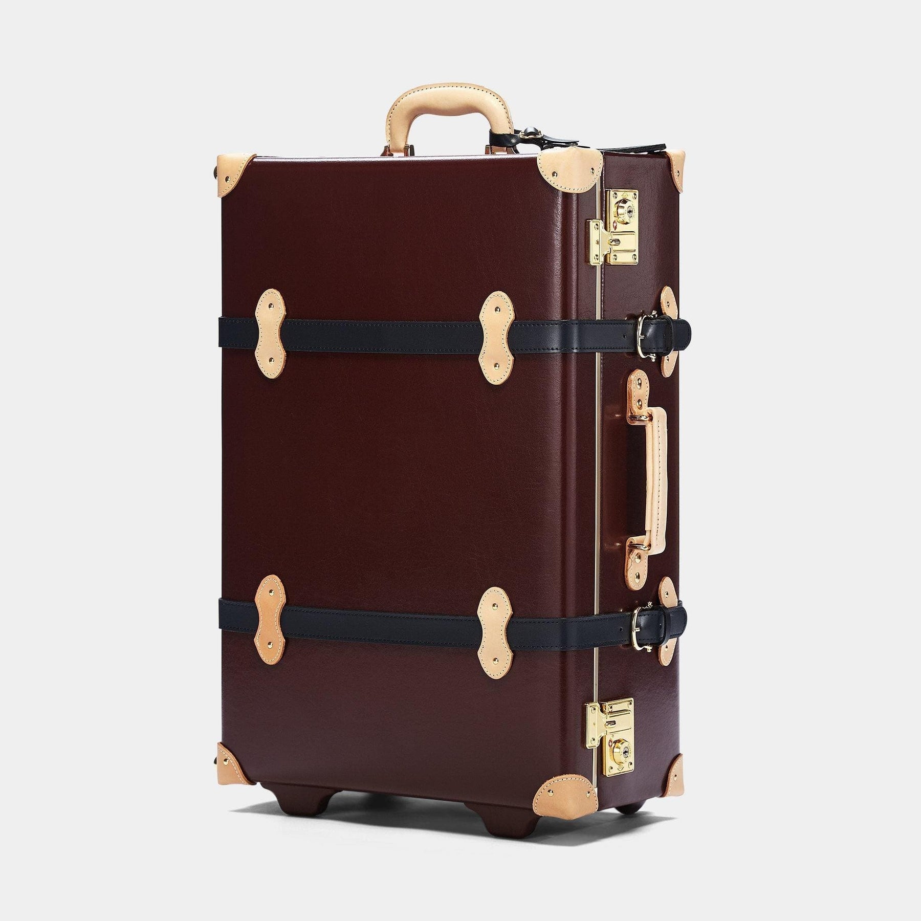 Angled product view of the stowaway Architect leather suitcase in burgundy