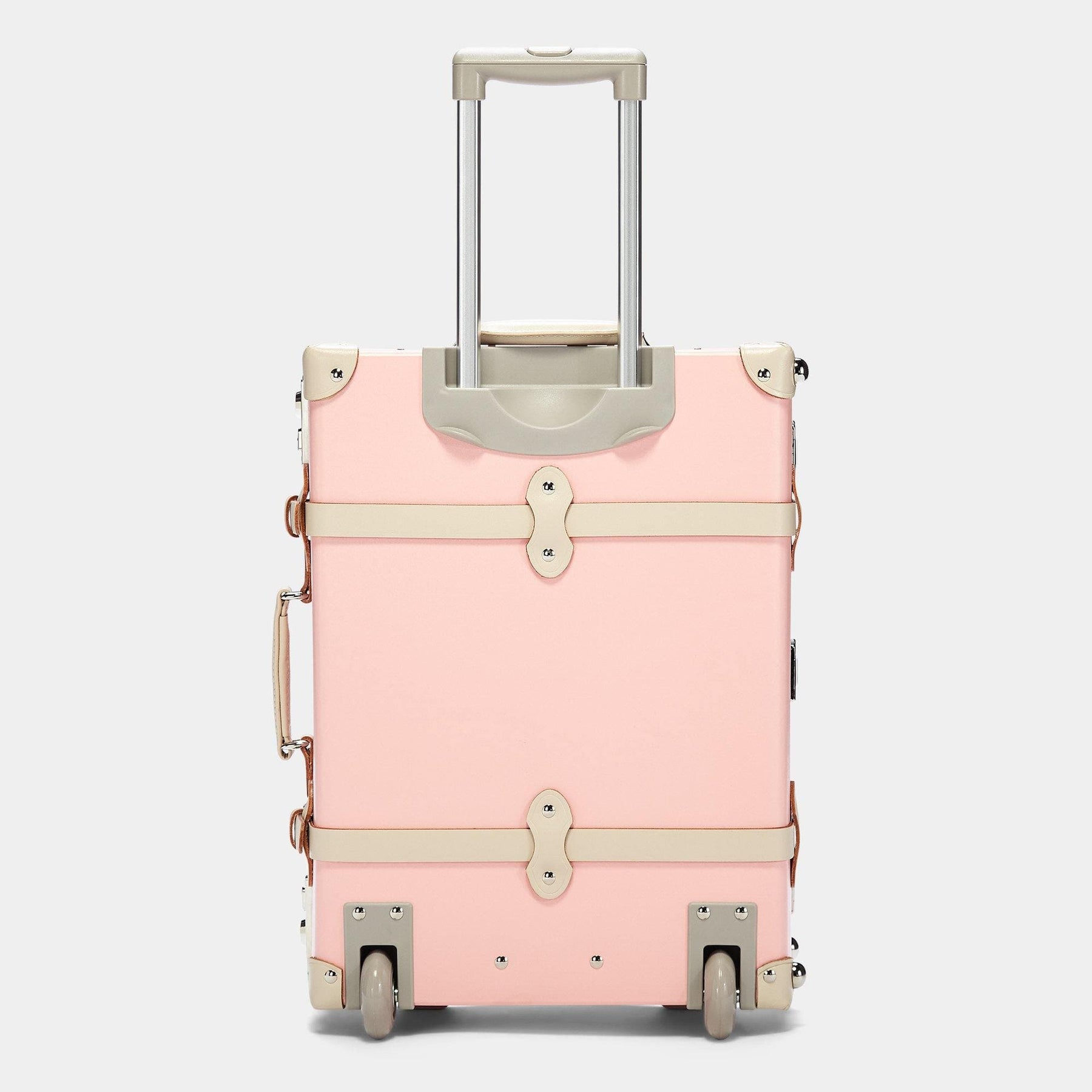 Back product view of the carry-on Botanist fibreboard suitcase in pink with raised handle