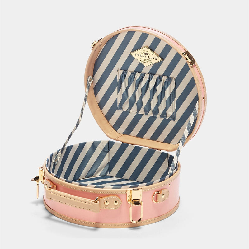 Open product view of the small hatbox Correspondent fibreboard suitcase in pink with blue and white stripe print lining