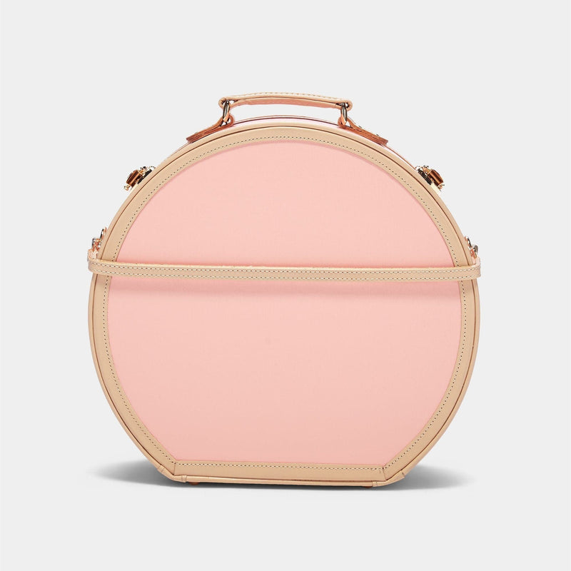Back product view of the large hatbox Correspondent fibreboard suitcase in pink with detachable suitcase strap