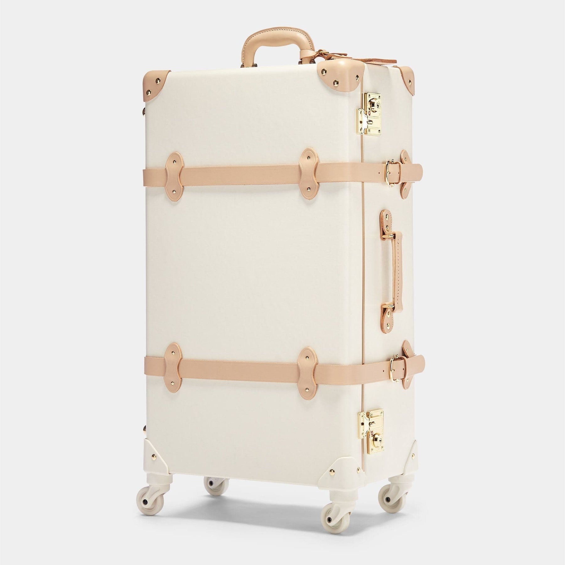Angled product view of the check-in spinner Sweetheart fibreboard suitcase in cream