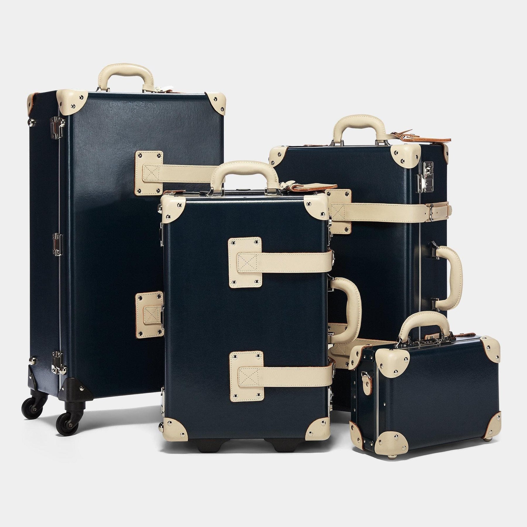 Steamline vintage luggage set of The Anthropologist leather suitcase in navy